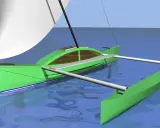 Un prao bateau vert, avec une voile blanche, navigue sur une eau bleue calme.