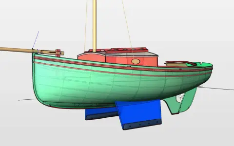 Maquette d'un voilier biquille aux coques vertes et rougies, avec deux dérives bleues distinctes.