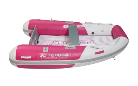 Un petit bateau gonflable rose et blanc, parfait pour rejoindre un grand bateau.