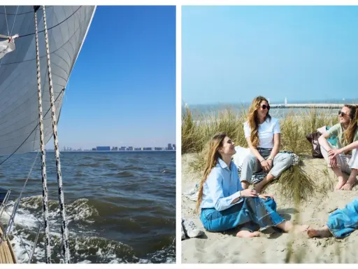Un voilier prend le large, ses voiles gonflées par le vent. Sur la plage, des amies profitent du soleil, un moment de détente avant d'embarquer pour une nouvelle aventure.