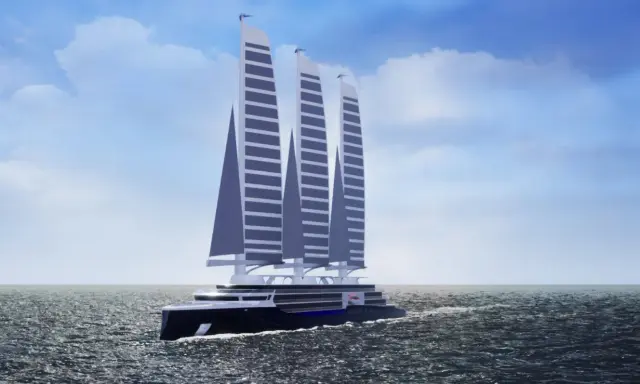 Un navire futuriste glisse sur l'eau, ses trois voiles rigides et élancées capturant le vent sous un ciel bleu parsemé de nuages.
