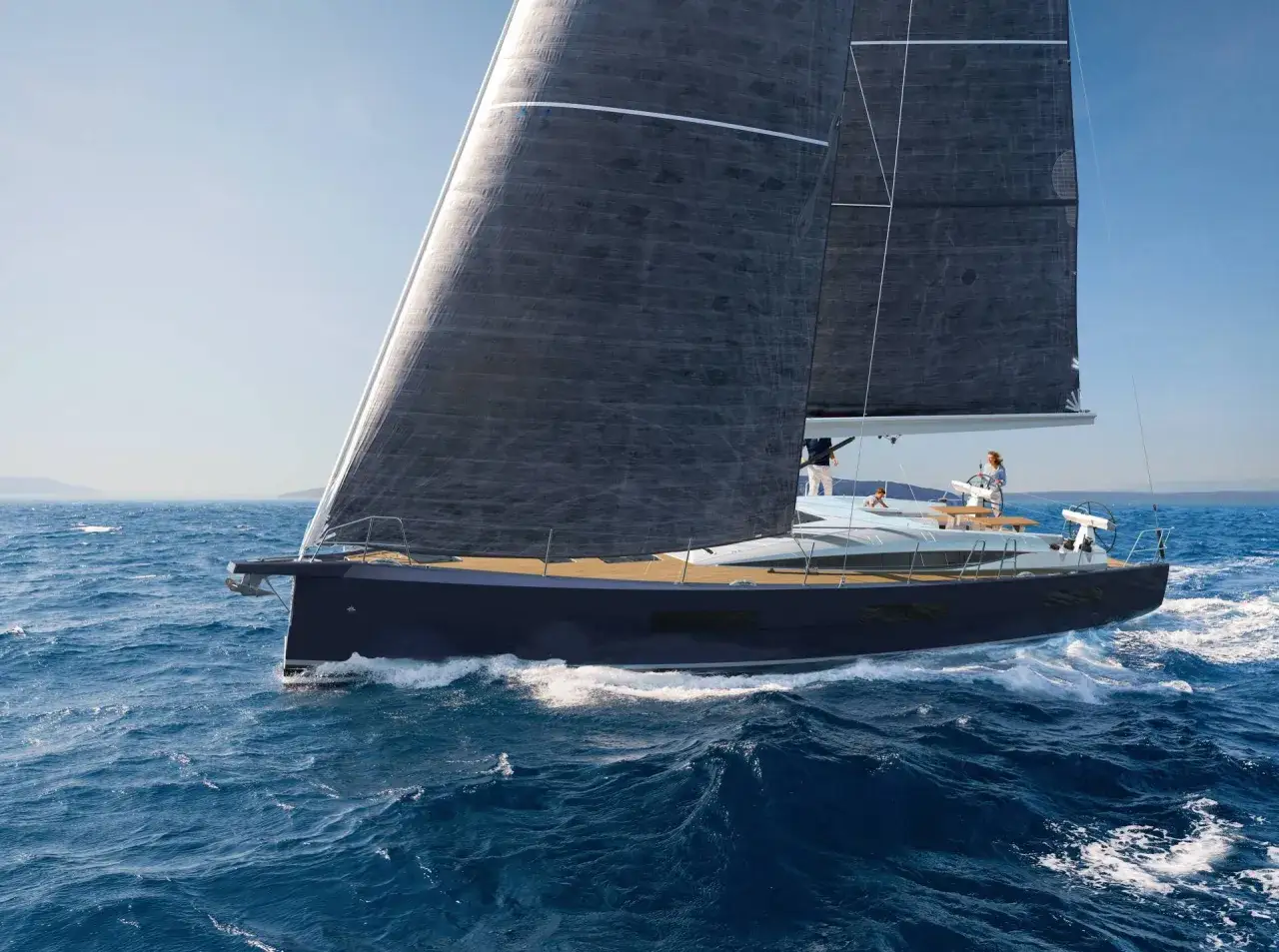 Un yacht de luxe bleu foncé navigue sur des eaux bleues vives, ses voiles noires gonflées par le vent.